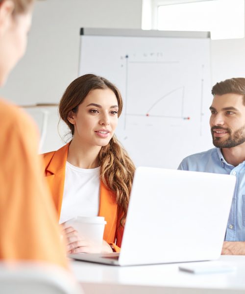 Firefly_A modern office scene with two professionals in a creative consulting meeting, discus 693442